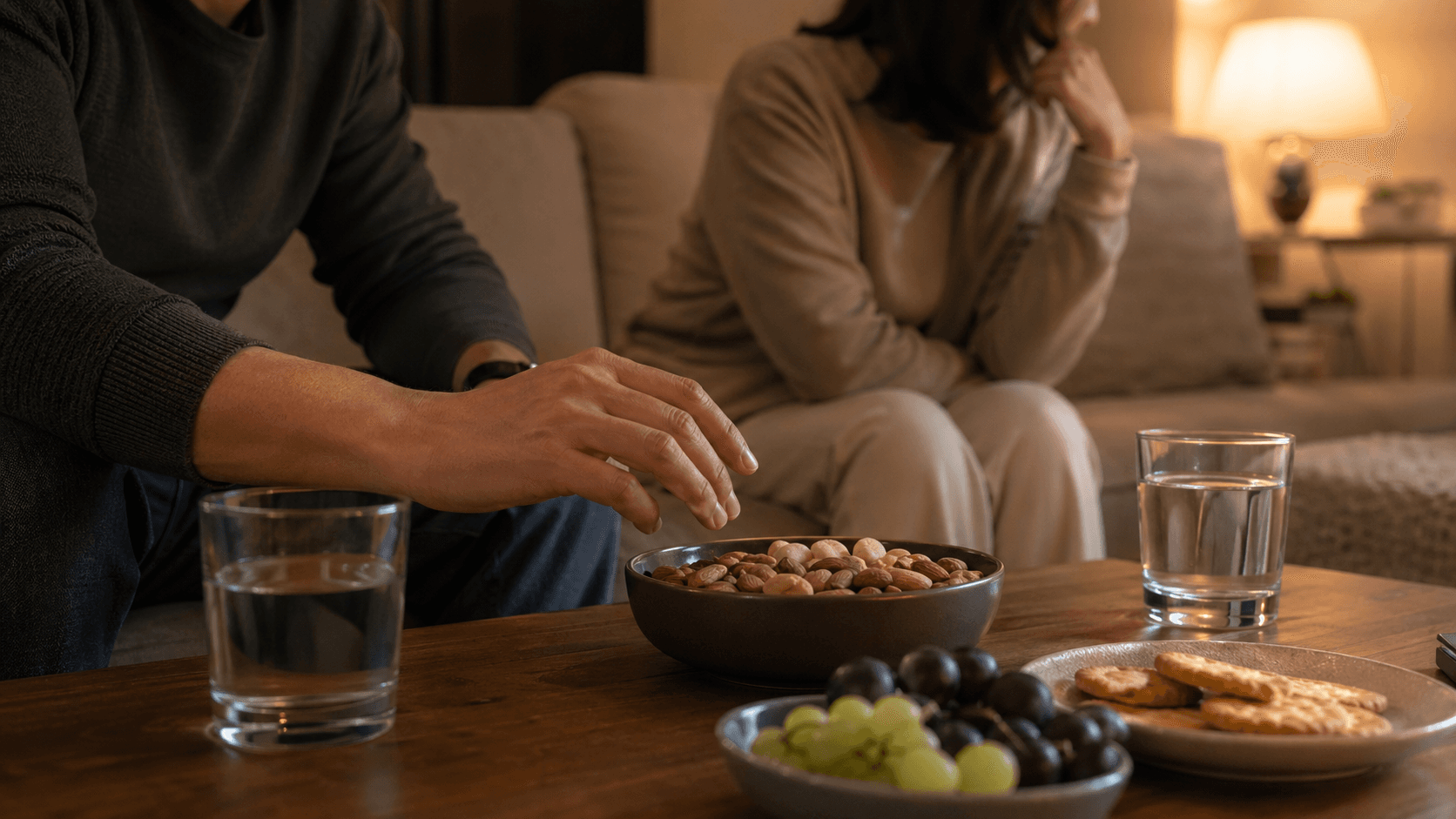 Quiet living room snack scene showing attentive awareness of a possible silent choking risk